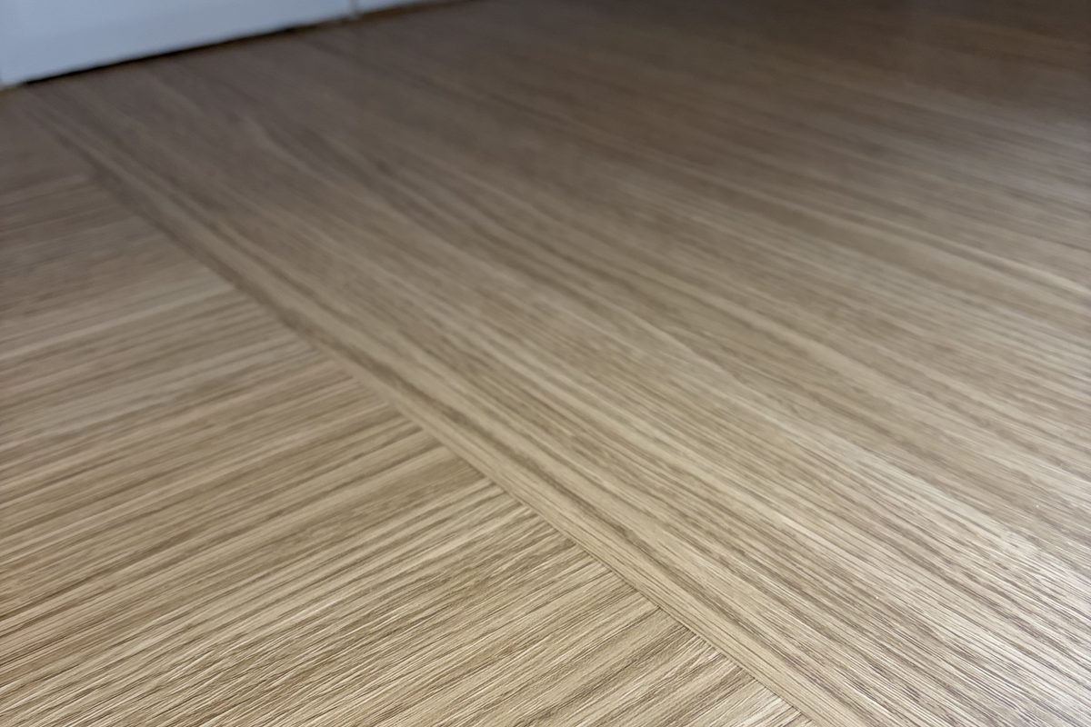 Close-up of a precision splice joint on a wrapped worktop