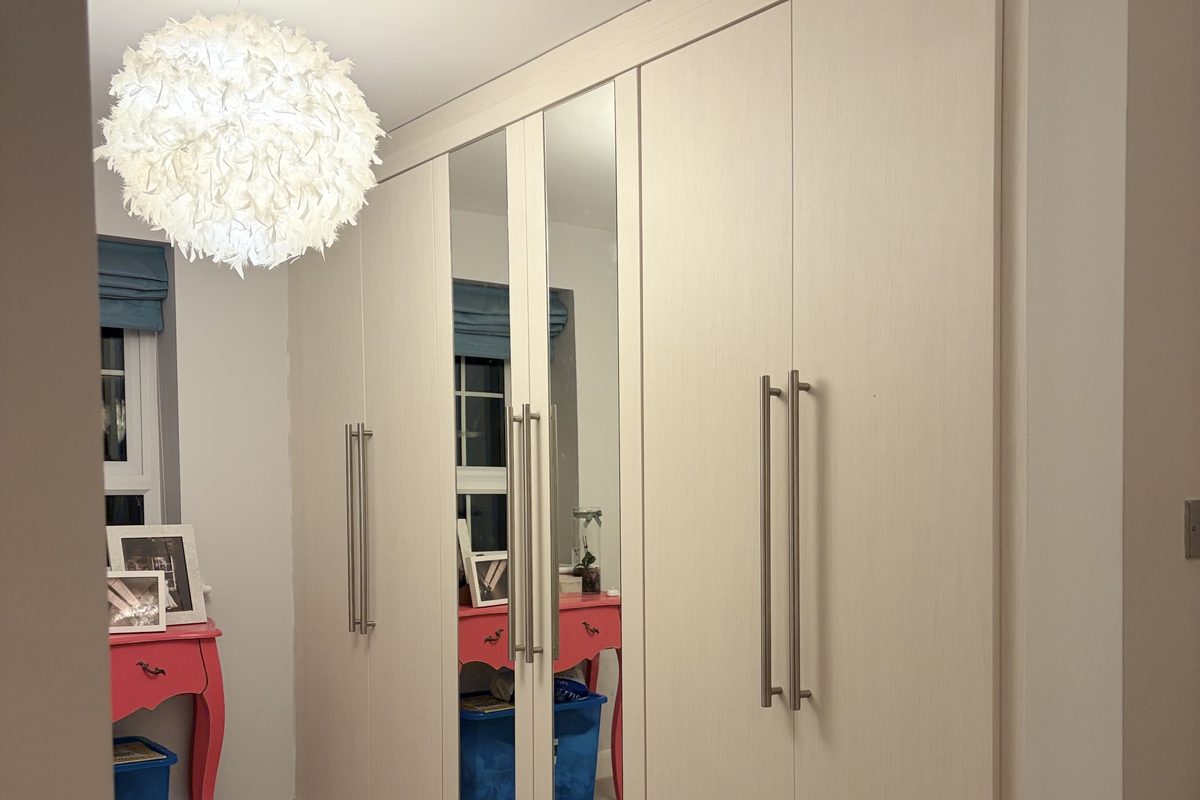 Wardrobe refreshed with a new architectural film finish rather than replaced