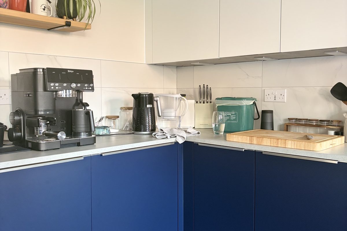 Kitchen cabinets wrapped in navy architectural film