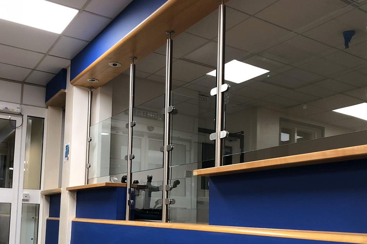 Commercial reception desk wrapped in architectural film