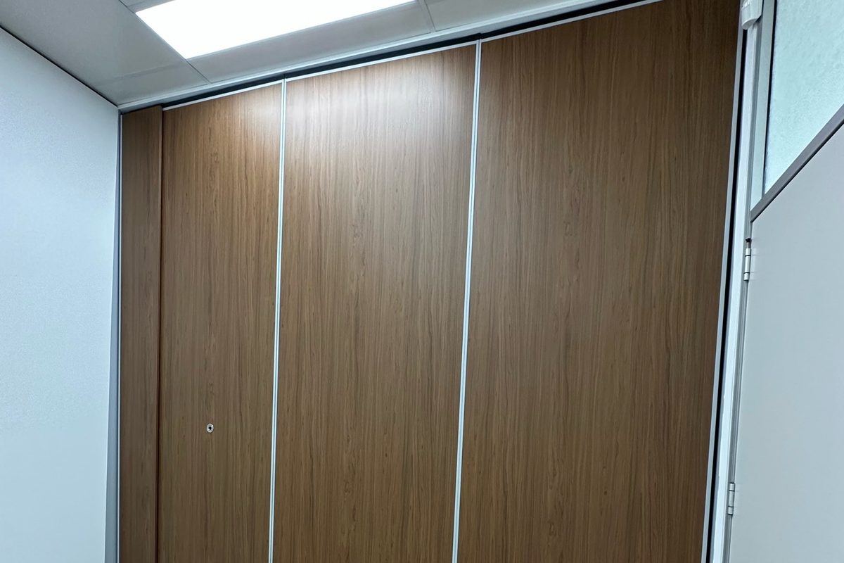 Office partition wrapped in architectural film